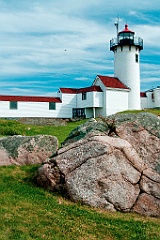 Rock Resembles Wave by Eastern Point Lighthouse Tower
